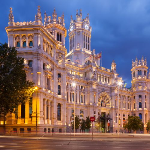 View of Palace of Communication in summer dusk. Madrid, Spain